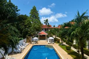 an aerial view of a resort with a swimming pool at Phuket Riviera Villas Hotel in Nai Harn Beach