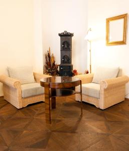 Posezení v ubytování Hotel U Zlateho jelena