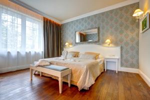 Łóżko lub łóżka w pokoju w obiekcie Hotel Afrodyta Business & Spa