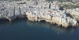 an aerial view of a city on a cliff at Dimora Talenti in Polignano a Mare