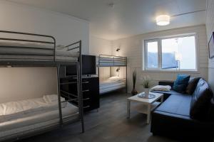 Northern Light Hotell/Camp Steinfjord tesisinde bir ranza yatağı veya ranza yatakları