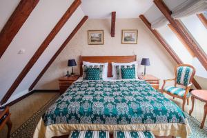 Postel nebo postele na pokoji v ubytování Arcadia Boutique Hotel