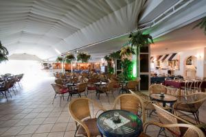 A restaurant or other place to eat at Playa Del Sol - Adults Only