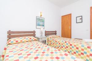 Postel nebo postele na pokoji v ubytování Casa Tradicional Can Picafort