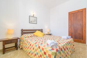 Postel nebo postele na pokoji v ubytování Casa Tradicional Can Picafort