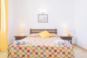 Postel nebo postele na pokoji v ubytování Casa Tradicional Can Picafort