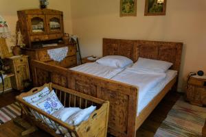 Postel nebo postele na pokoji v ubytování Apartment Eko Etno selo Stara Kapela, Pavina kuća