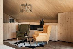A seating area at Ferienhaus zum Stubaier Gletscher - Dorf