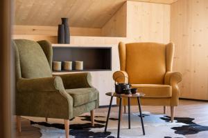 A seating area at Ferienhaus zum Stubaier Gletscher - Dorf