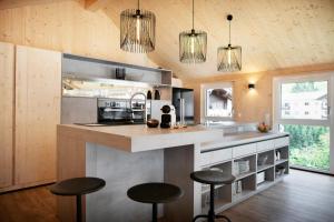 A kitchen or kitchenette at Ferienhaus zum Stubaier Gletscher - Dorf
