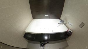 Ванная комната в ホテルオリジン Hotel Origin 男塾ホテルグループ
