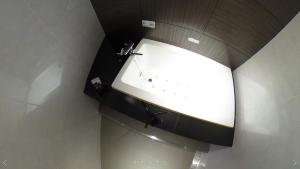 Vannituba majutusasutuses ホテルオリジン Hotel Origin 男塾ホテルグループ