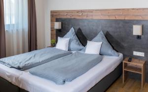 Postel nebo postele na pokoji v ubytování Landhotel Zum Adler