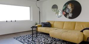 Posezení v ubytování Einzigartiges Loft von Loftalive