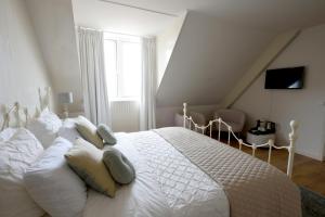 Posteľ alebo postele v izbe v ubytovaní De Oude Pastorie Lisse