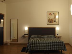 Postel nebo postele na pokoji v ubytování Hotel Eden
