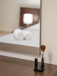 A bed or beds in a room at Rethymno Moonlight