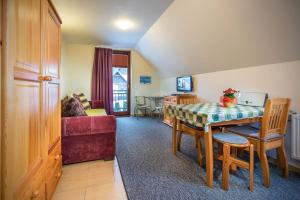 A seating area at Guest House Privat Pod Lesom
