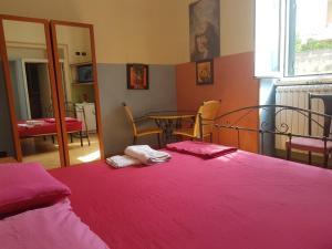 Postel nebo postele na pokoji v ubytování B&B Elio's