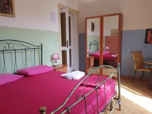 Postel nebo postele na pokoji v ubytování B&B Elio's