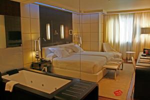 Кровать или кровати в номере Gran Hotel Nagari Boutique & Spa