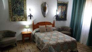 Posteľ alebo postele v izbe v ubytovaní Hotel Rural Hospedería de los Calatravos