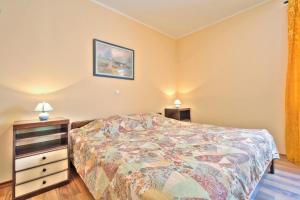 Postel nebo postele na pokoji v ubytování Lorena Apartments
