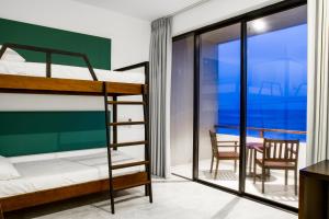 Una cama o camas en una habitación de Lazy Koala