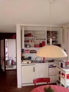 Kuchyň nebo kuchyňský kout v ubytování Casa Dany