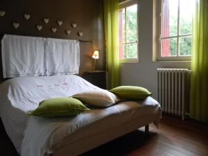 Кровать или кровати в номере Domaine de la Rigaudie