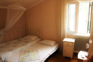 Postel nebo postele na pokoji v ubytování Mon Repos Two Floor Apartment