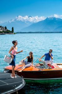 
people on a boat in the water at Eurotel Montreux in Montreux
