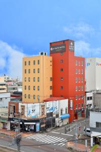 a group of buildings in a city with a street at A-GATE Hotel Hakodate in Hakodate