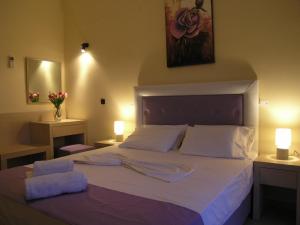 Un pat sau paturi într-o cameră la A Vista