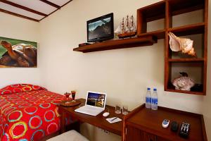 TV a/nebo společenská místnost v ubytování Arena Blanca Eco Hotel