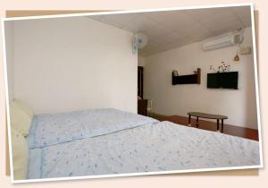 Letto o letti in una camera di Signal B&B 信號咖ㄟ厝 民宿