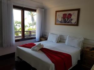 Postel nebo postele na pokoji v ubytování Coronado Inn Hotel + 88 fotografií