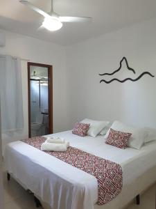 Ліжко або ліжка в номері Pousada Morro do Pico
