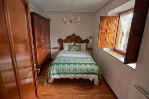 A bed or beds in a room at Casa Pichi