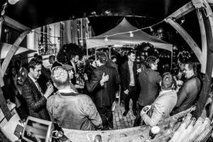 a black and white photo of a crowd of people at No131 The Promenade in Cheltenham