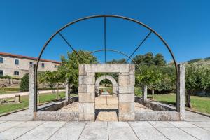 Jardín al aire libre en Eurostars Monumento Monasterio de San Clodio Hotel