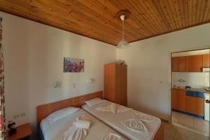 Postel nebo postele na pokoji v ubytování White Rock Apartments