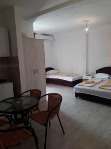 Postel nebo postele na pokoji v ubytování Apartmani Andrea-jaz