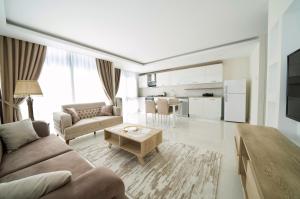 Кухня или мини-кухня в Karia Plus City Apartments
