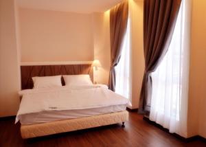 Postel nebo postele na pokoji v ubytování 9 Square Hotel - Petaling Jaya