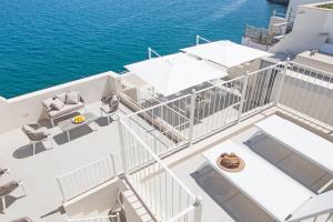 a balcony with a view of the water at Dimora Talenti in Polignano a Mare
