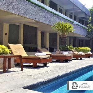 Bazén v ubytování NEhotel Nueva Estancia nebo v jeho okolí