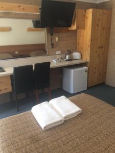 Kuchyň nebo kuchyňský kout v ubytování Alexander Motor Inn