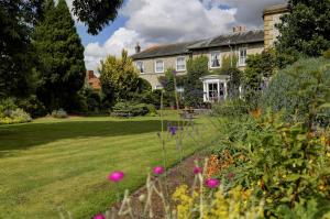 a house with a garden in front of it at Best Western Forest and Vale Hotel in Pickering
