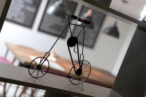 a black object is hanging on a table at Best Western White House Hotel in Watford